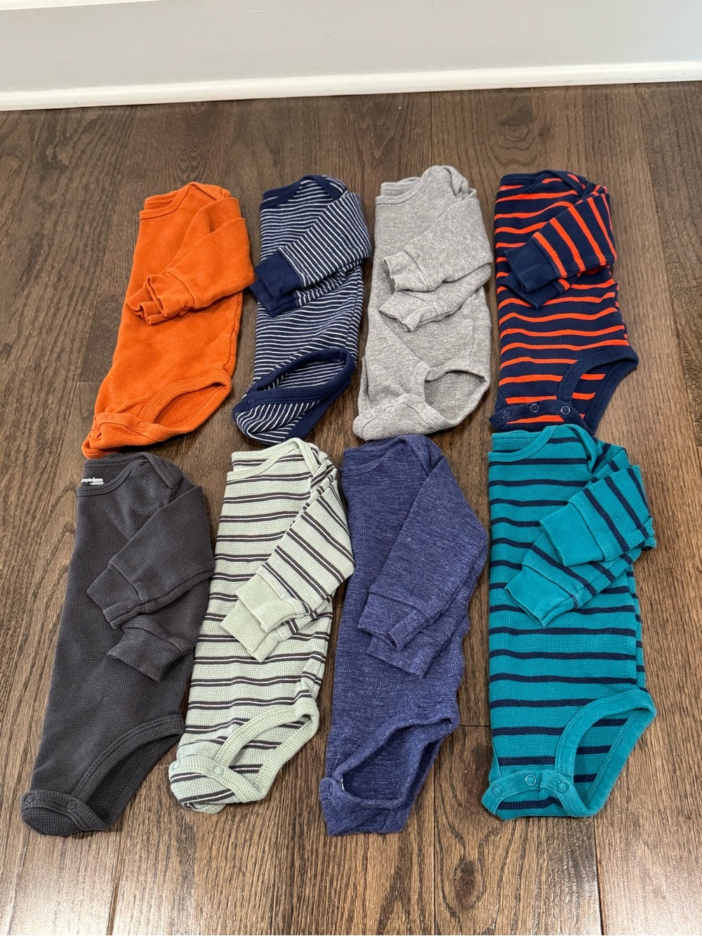Set of 8 Carter’s brand thermal long sleeved onesies